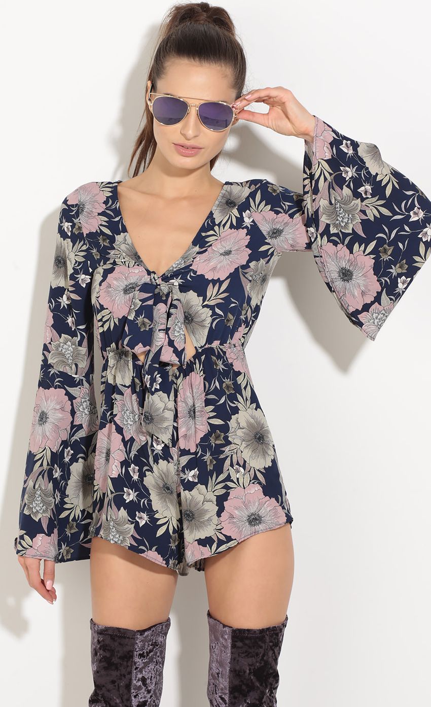 Picture Floral Tie-Up Romper In Navy. Source: https://media-img.lucyinthesky.com/data/Sep16_1/850xAUTO/0Y5A6208.JPG