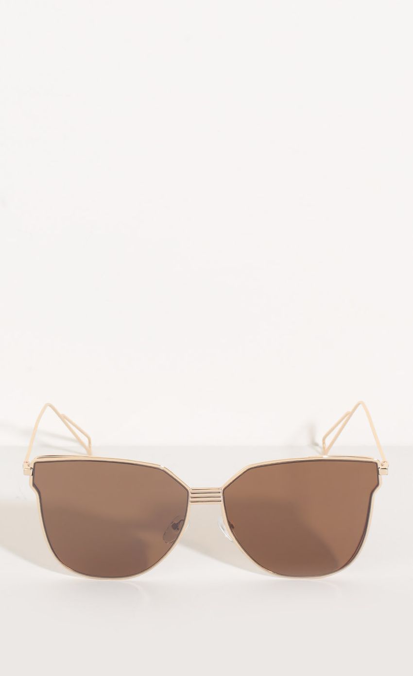 Picture Flat Lens Cat Eye Sunglasses In Bronze. Source: https://media-img.lucyinthesky.com/data/Sep16_2/850xAUTO/0Y5A1866.JPG