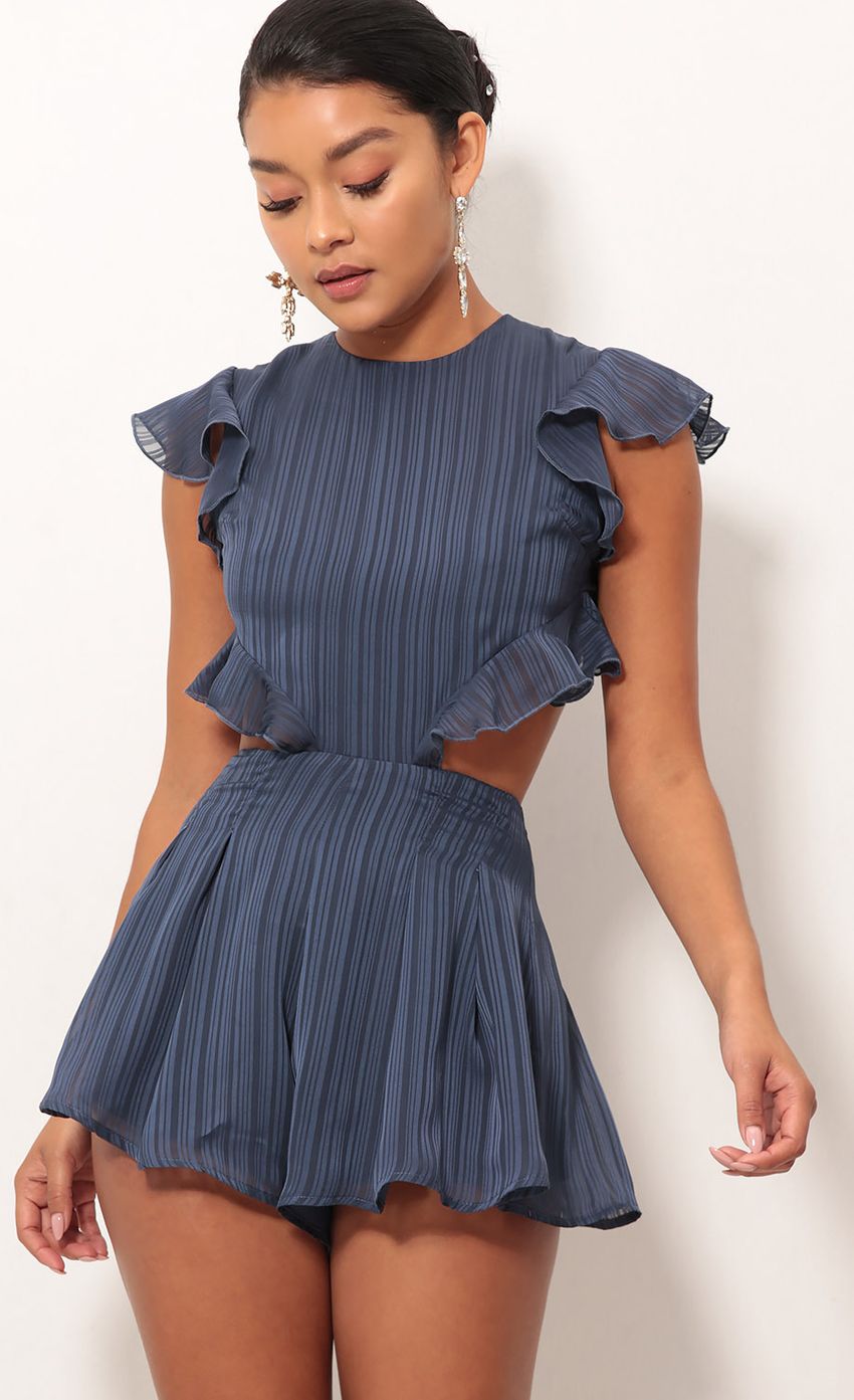 Picture Kara Cutout Romper in Blue Stripes. Source: https://media-img.lucyinthesky.com/data/Sep18_2/850xAUTO/0Y5A8256XS.JPG