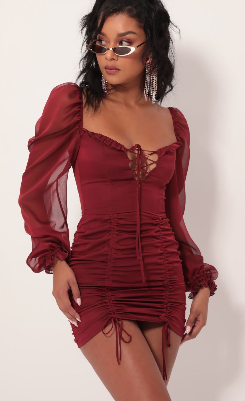 Picture Couture Chiffon Puff Sleeve Dress in Merlot. Source: https://media-img.lucyinthesky.com/data/Sep19_1/850xAUTO/781A1761.JPG