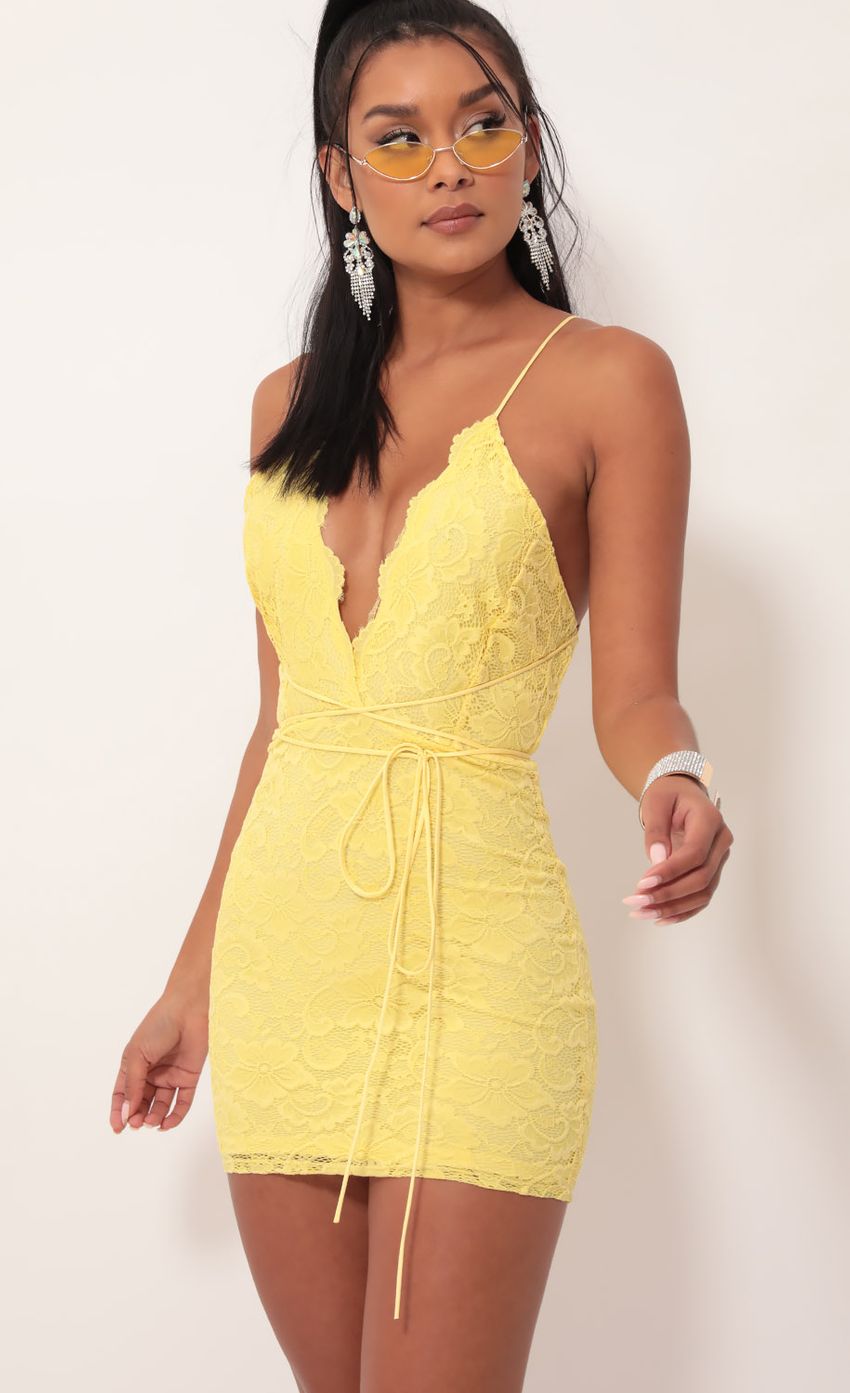 Picture Plunge Lace Dress in Yellow. Source: https://media-img.lucyinthesky.com/data/Sep19_2/850xAUTO/781A4855.JPG