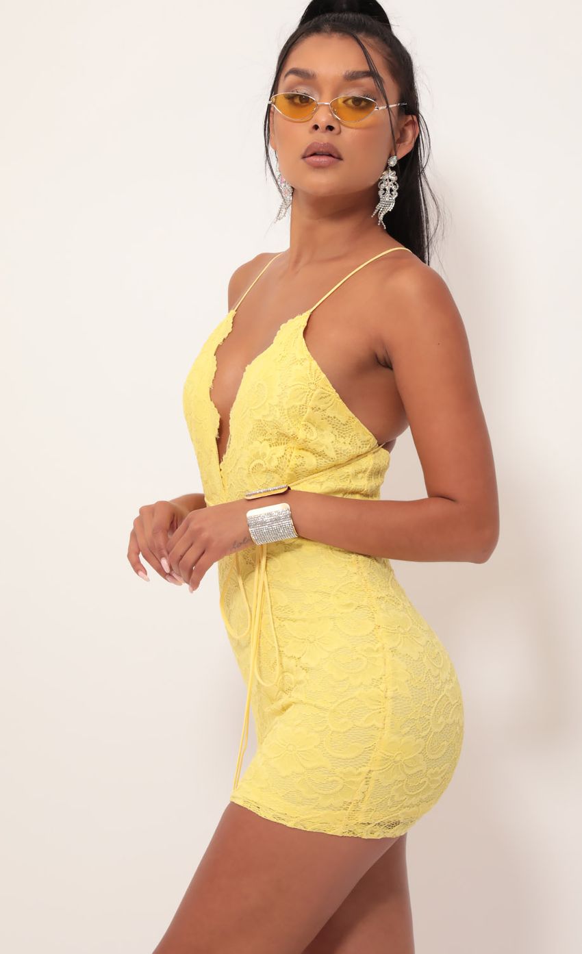 Picture Plunge Lace Dress in Yellow. Source: https://media-img.lucyinthesky.com/data/Sep19_2/850xAUTO/781A4867.JPG