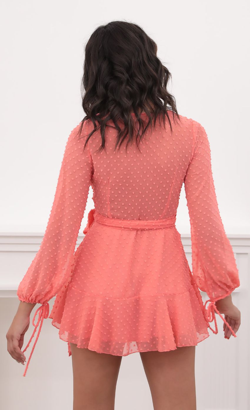 Picture Dotted Long Sleeve Wrap Dress in Coral. Source: https://media-img.lucyinthesky.com/data/Sep20_1/850xAUTO/781A1106.JPG