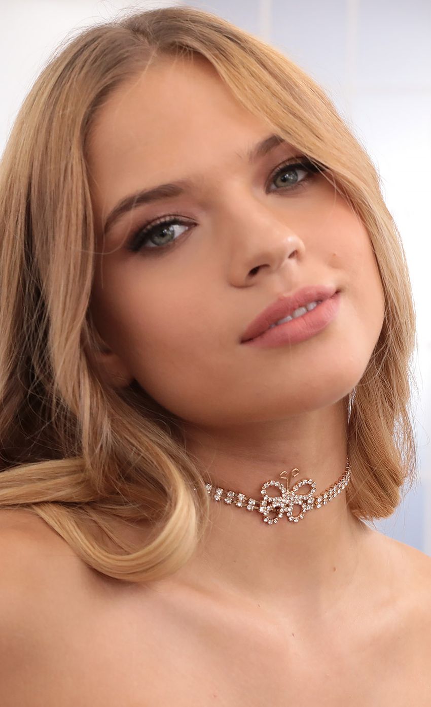 Picture Forever Young Butterfly Choker in Gold. Source: https://media-img.lucyinthesky.com/data/Sep20_1/850xAUTO/781A2886L.JPG