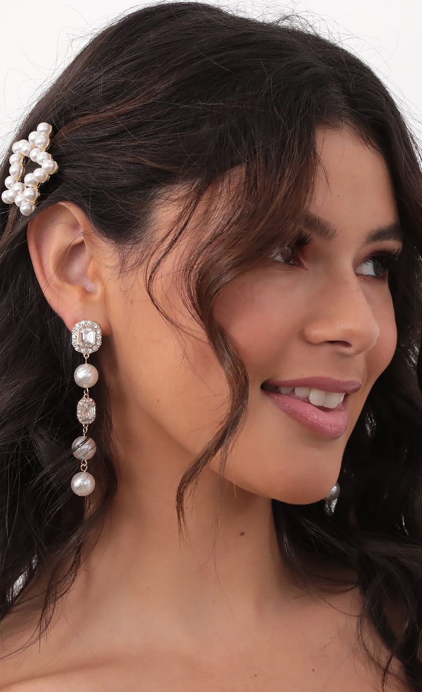 Picture Pearls and Diamante Dangling Earrings. Source: https://media-img.lucyinthesky.com/data/Sep20_1/850xAUTO/781A8265.JPG