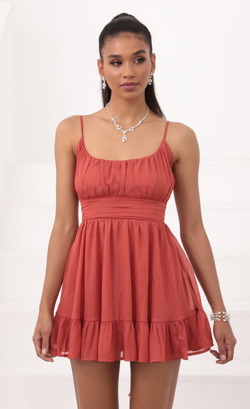 Picture Chiffon Ruffled Dress in Rust. Source: https://media-img.lucyinthesky.com/data/Sep20_2/850xAUTO/781A0602.JPG
