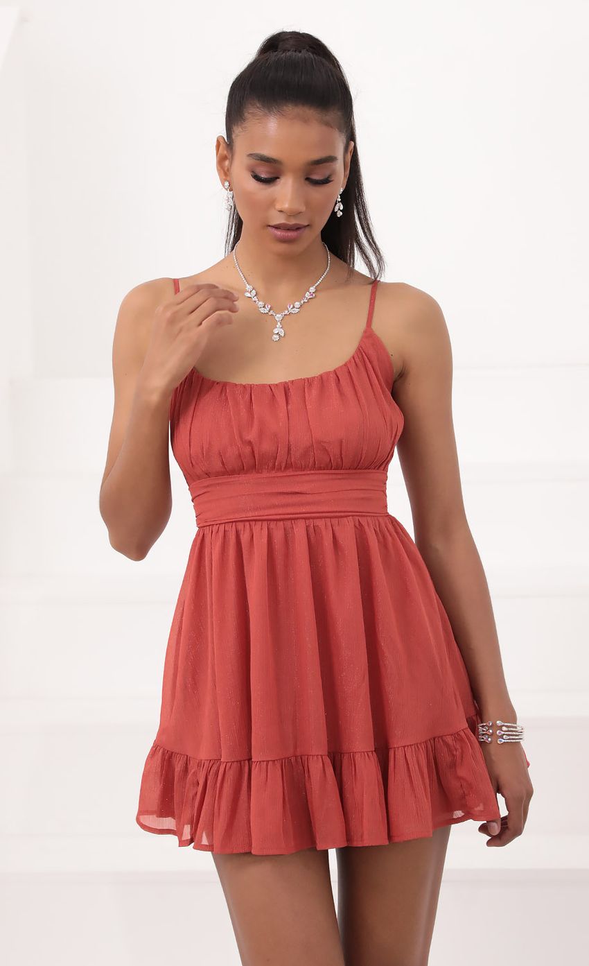 Picture Chiffon Ruffled Dress in Rust. Source: https://media-img.lucyinthesky.com/data/Sep20_2/850xAUTO/781A0631.JPG