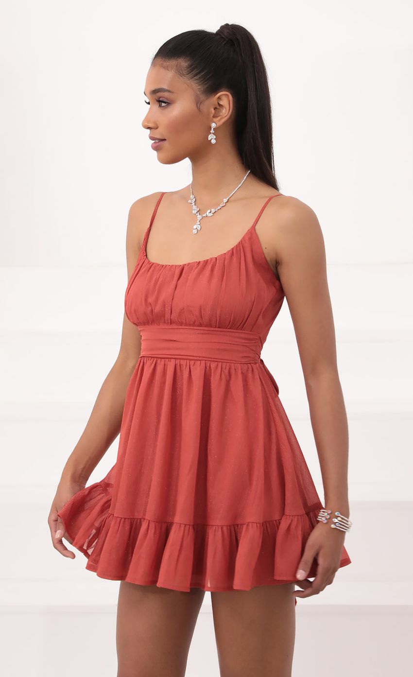 Picture Chiffon Ruffled Dress in Rust. Source: https://media-img.lucyinthesky.com/data/Sep20_2/850xAUTO/781A0666.JPG