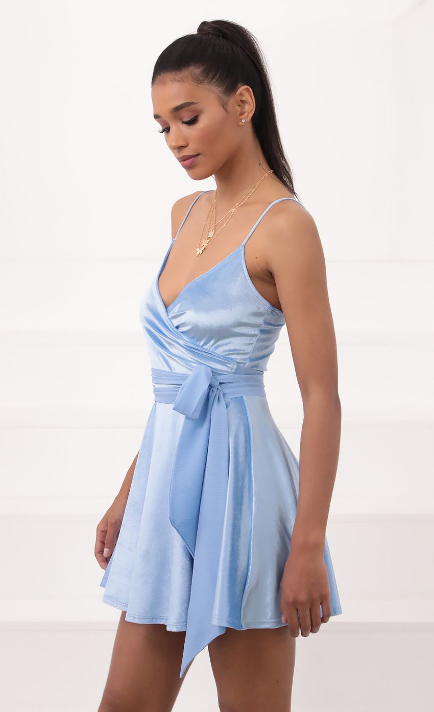 Picture Velvet Wrap Dress in Blue. Source: https://media-img.lucyinthesky.com/data/Sep20_2/850xAUTO/781A1141.JPG