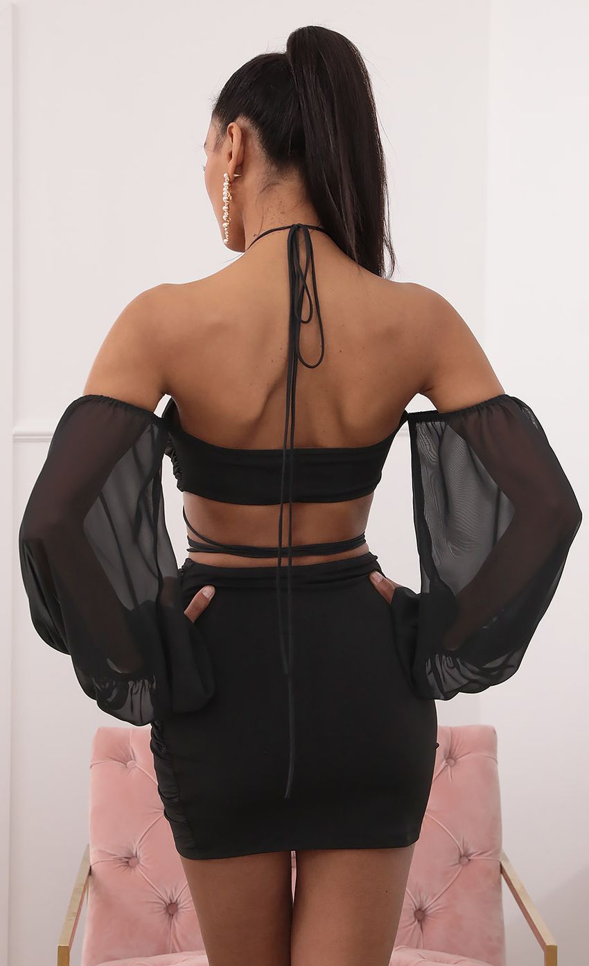 Picture Off-the-Shoulder Two Piece Long Sleeve Set in Black. Source: https://media-img.lucyinthesky.com/data/Sep20_2/850xAUTO/781A5216.JPG