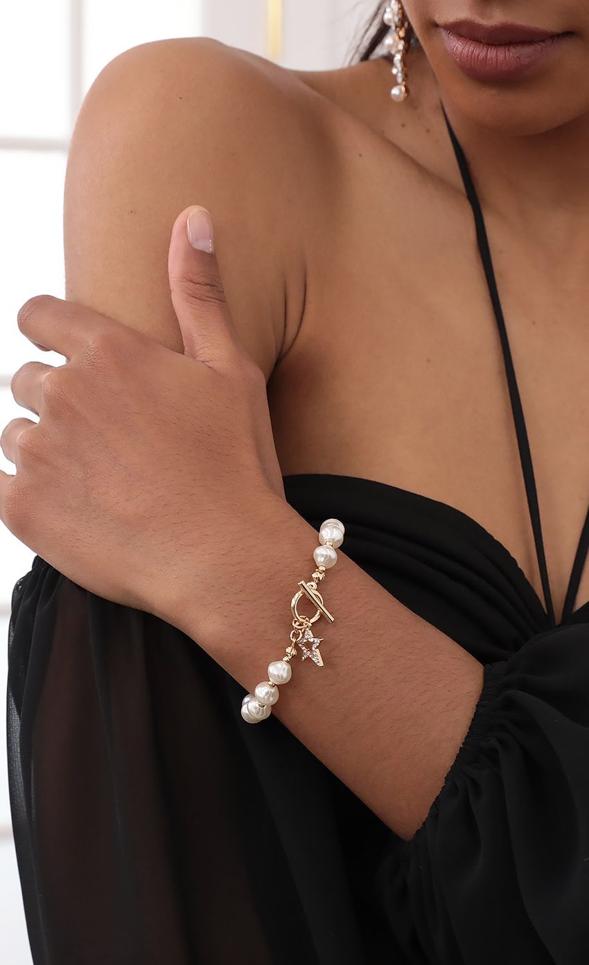 Picture Pearl Star Bracelet. Source: https://media-img.lucyinthesky.com/data/Sep20_2/850xAUTO/781A5322.JPG