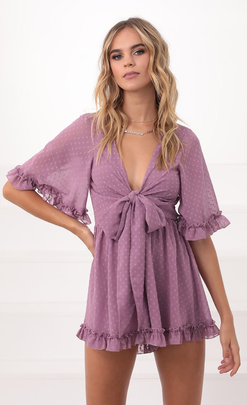 Picture Baylee Ruffle Romper in Lavender. Source: https://media-img.lucyinthesky.com/data/Sep20_2/850xAUTO/781A9466.JPG