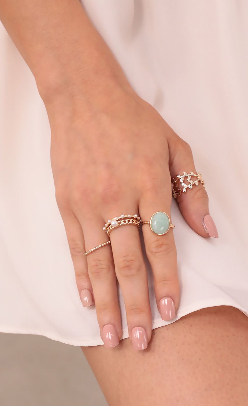 Picture Lucky Sage Ring Set in Gold. Source: https://media-img.lucyinthesky.com/data/Sep21_1/850xAUTO/1V9A0319.JPG