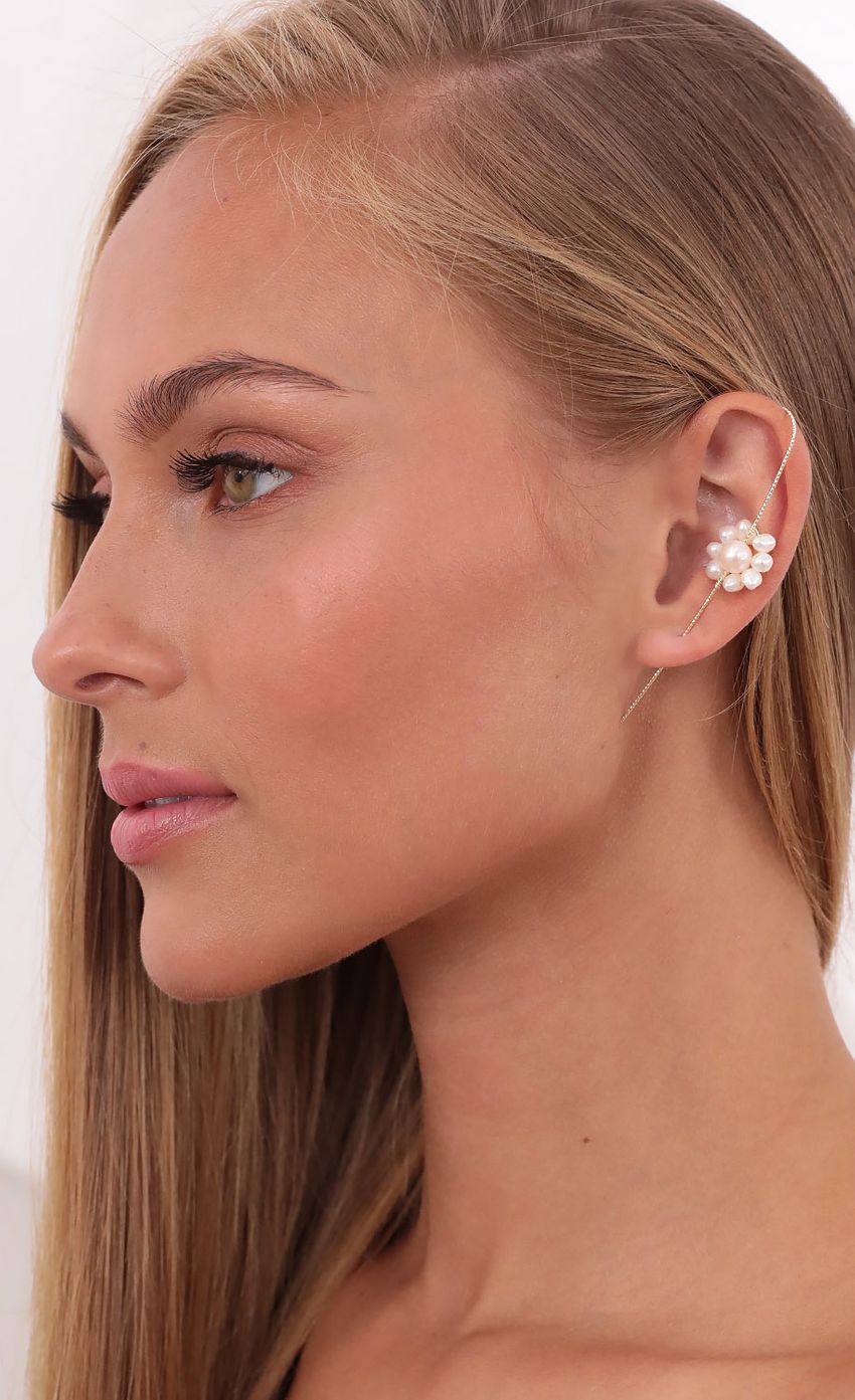 Picture Blossoming Pearl Ear Cuff. Source: https://media-img.lucyinthesky.com/data/Sep21_1/850xAUTO/1V9A1937.JPG