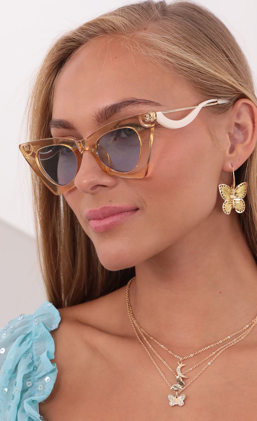 Picture Sweet Daze Cat Eye Sunglasses in Clear Yellow. Source: https://media-img.lucyinthesky.com/data/Sep21_1/850xAUTO/1V9A2745.JPG