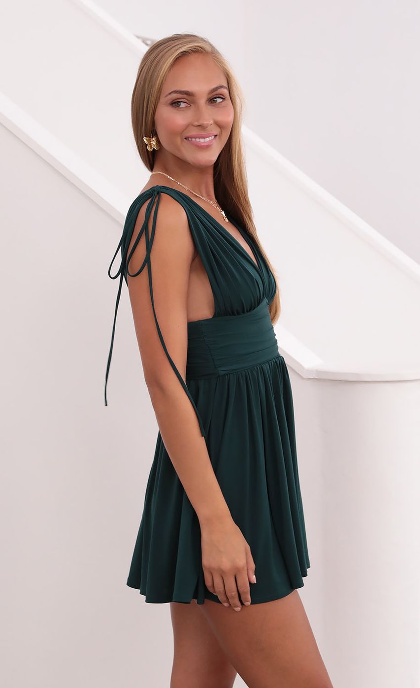 Picture Fit and Flare Dress in Hunter Green. Source: https://media-img.lucyinthesky.com/data/Sep21_1/850xAUTO/1V9A3037.JPG