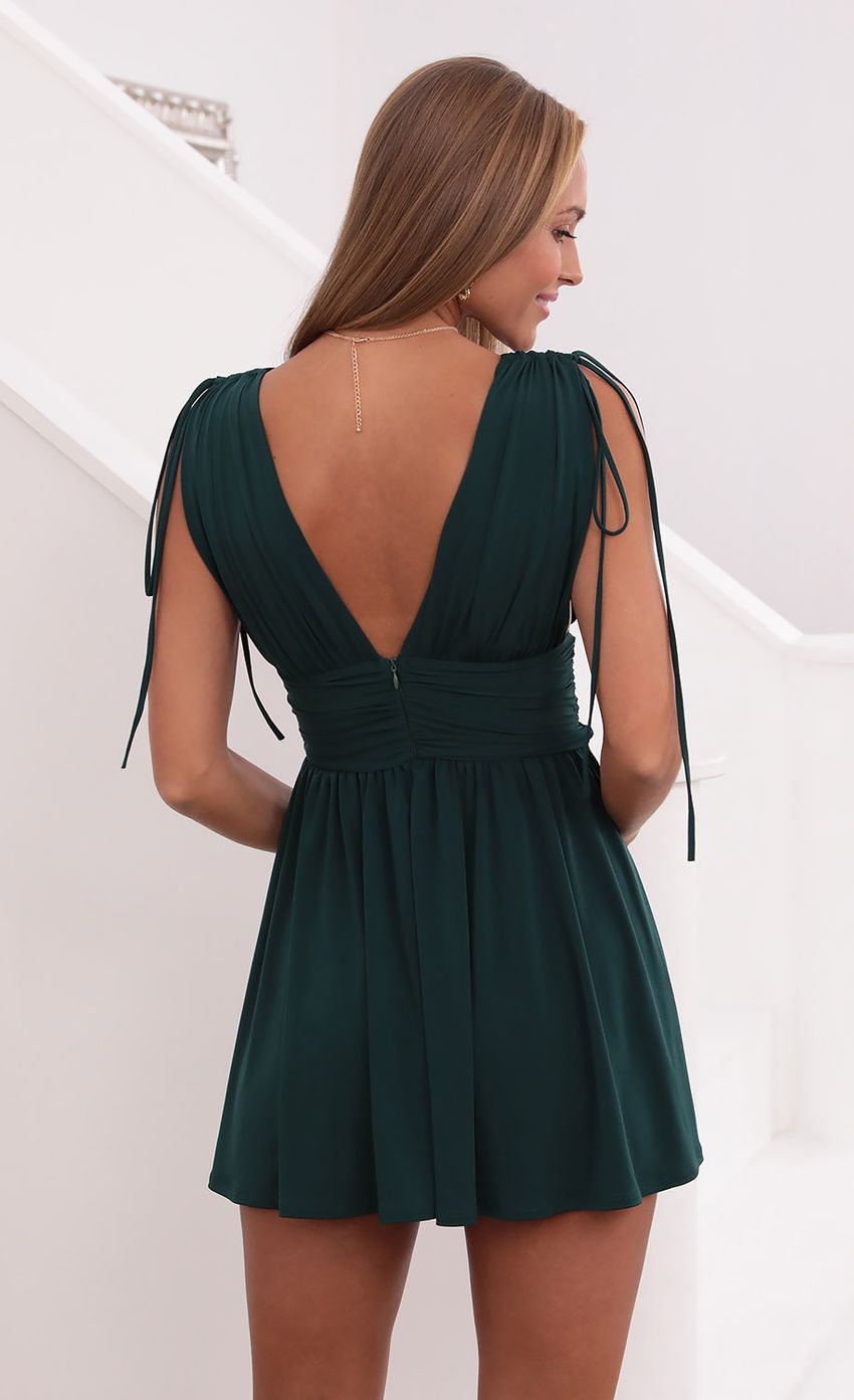 Picture Fit and Flare Dress in Hunter Green. Source: https://media-img.lucyinthesky.com/data/Sep21_1/850xAUTO/1V9A3045.JPG