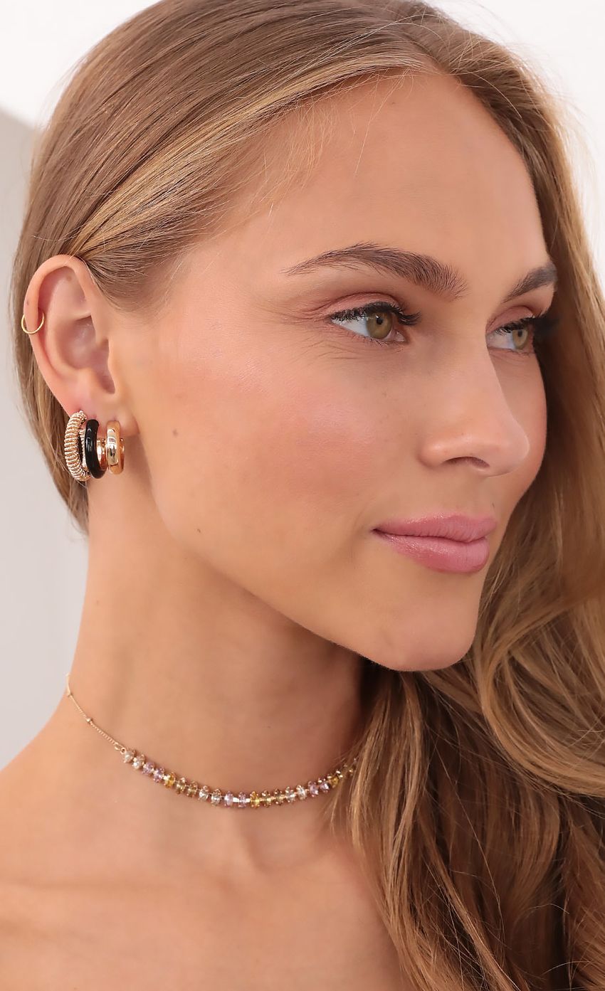 Picture Guard Your Heart Earring Set in Gold. Source: https://media-img.lucyinthesky.com/data/Sep21_1/850xAUTO/1V9A7207.JPG