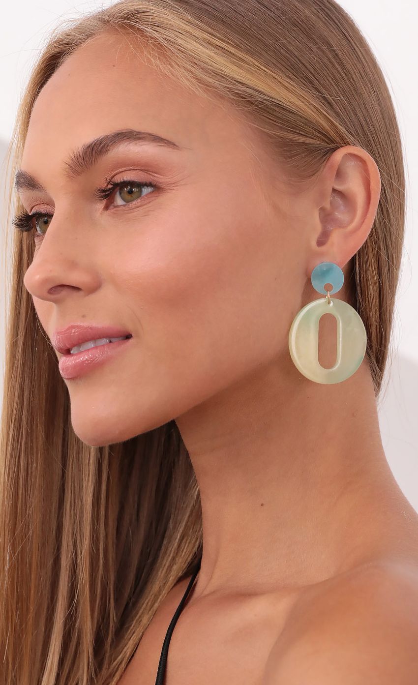 Picture Stellar Vibes Ombre Dangle Earrings in Mint. Source: https://media-img.lucyinthesky.com/data/Sep21_2/850xAUTO/1V9A3010.JPG