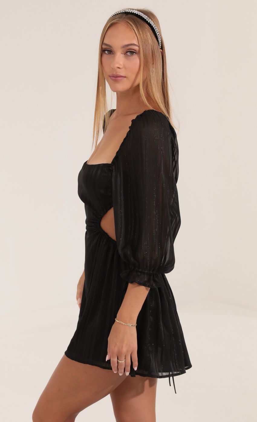 Picture Stripped Chiffon Open Back Dress in Black. Source: https://media-img.lucyinthesky.com/data/Sep22/850xAUTO/0162fc62-954a-4dff-b00f-1bfd8769addc.jpg