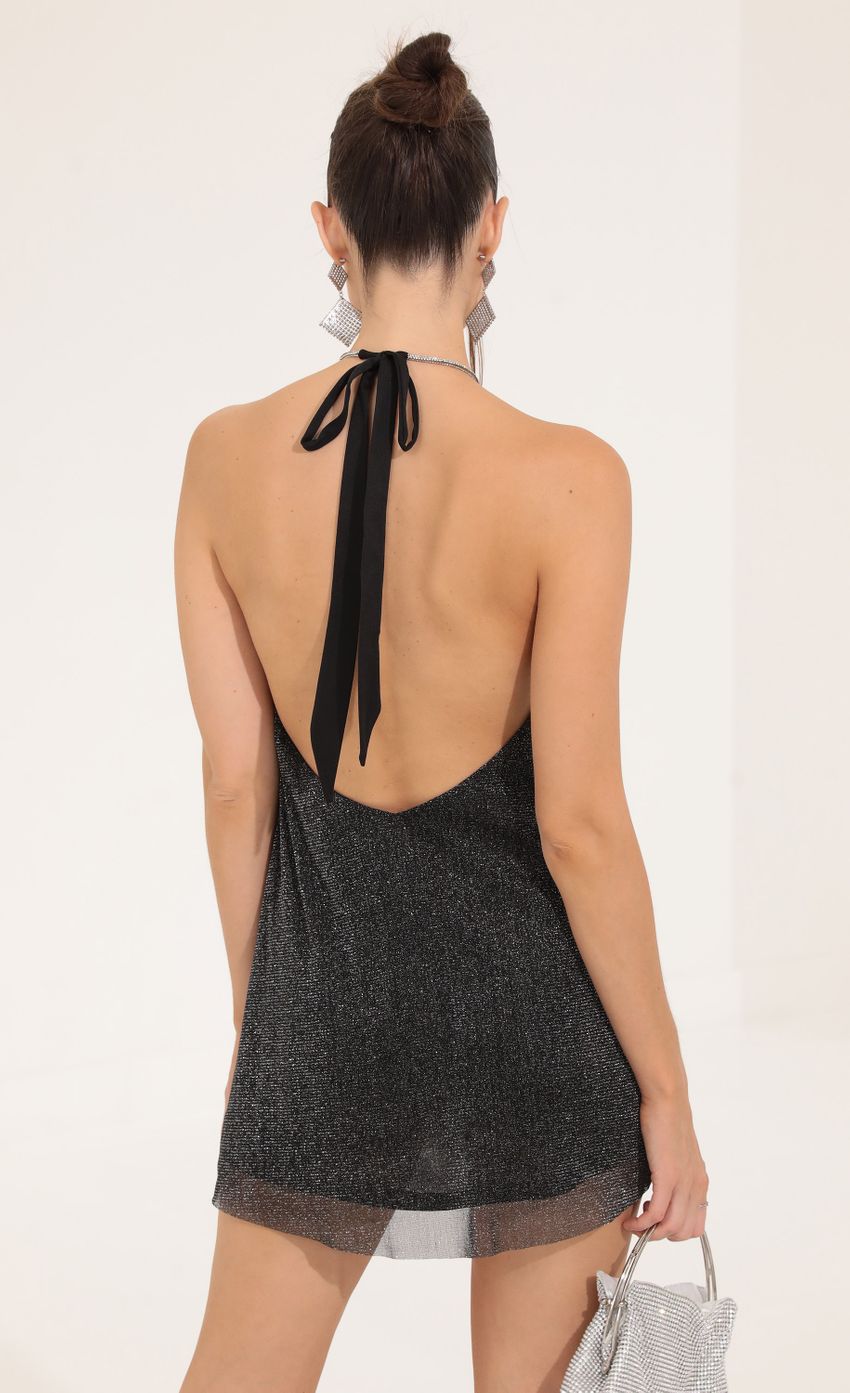Picture Glitter Open Back Dress in Black. Source: https://media-img.lucyinthesky.com/data/Sep22/850xAUTO/13843a2a-eeb6-489b-8d31-828dbe76515f.jpg