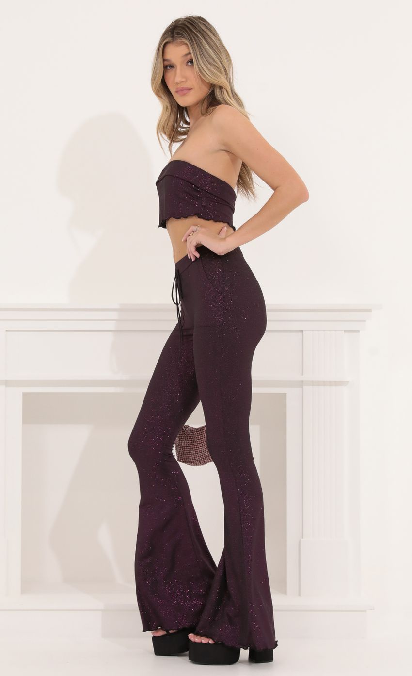 Picture Purple Glitter Two Piece Pant Set in Black. Source: https://media-img.lucyinthesky.com/data/Sep22/850xAUTO/33428192-5ac5-4f0f-9e31-f5a06b93ca54.jpg
