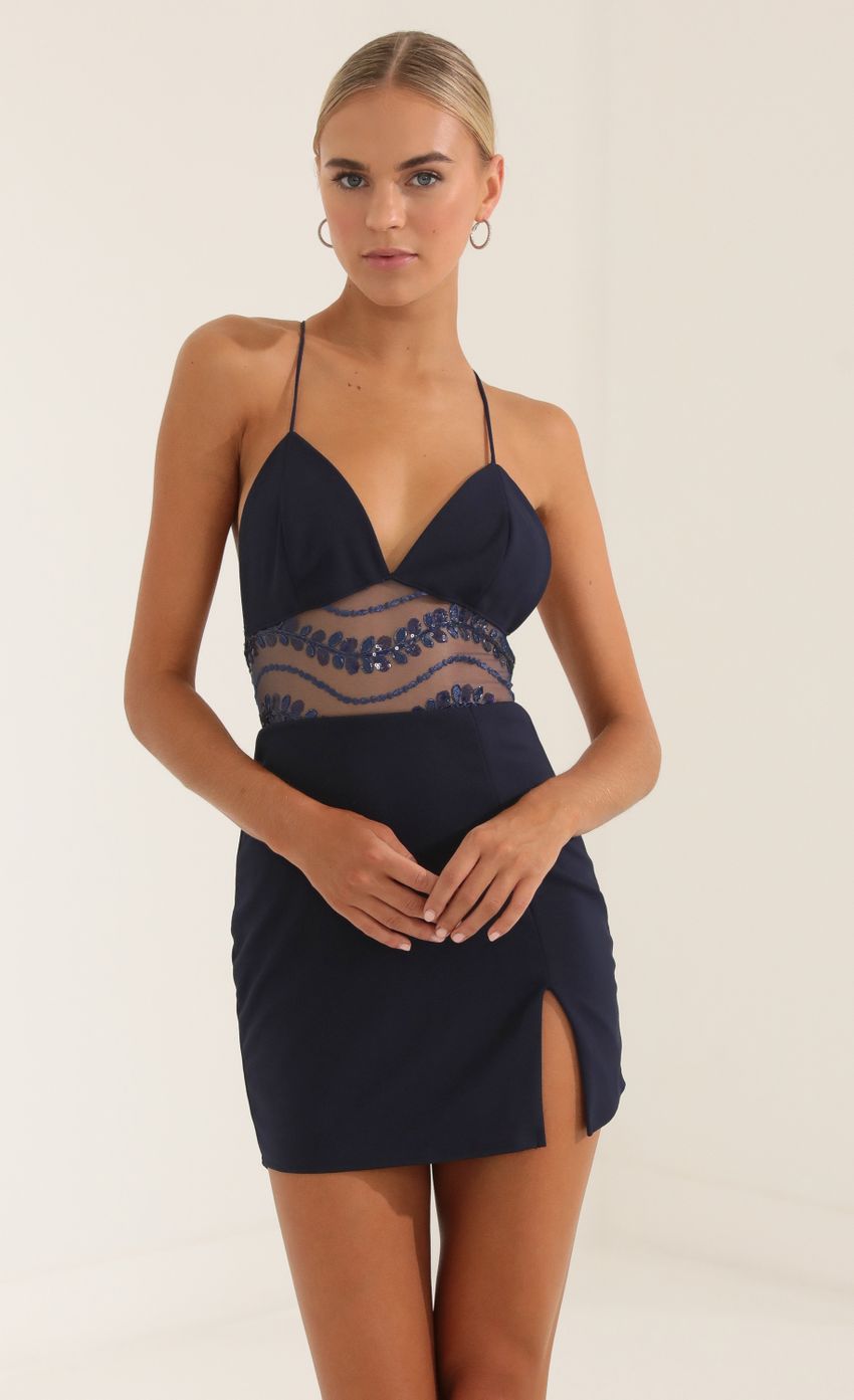 Picture Embroidered Sequin Cutout Dress in Navy. Source: https://media-img.lucyinthesky.com/data/Sep22/850xAUTO/439bffae-893e-40fd-ac02-178b00e84b18.jpg
