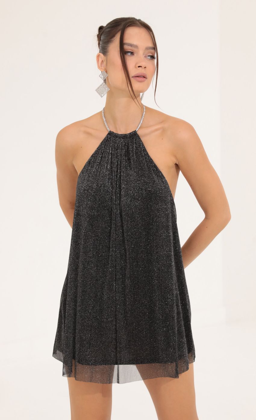 Picture Glitter Open Back Dress in Black. Source: https://media-img.lucyinthesky.com/data/Sep22/850xAUTO/47732d63-516e-4a6c-b648-5239d6e1a81b.jpg
