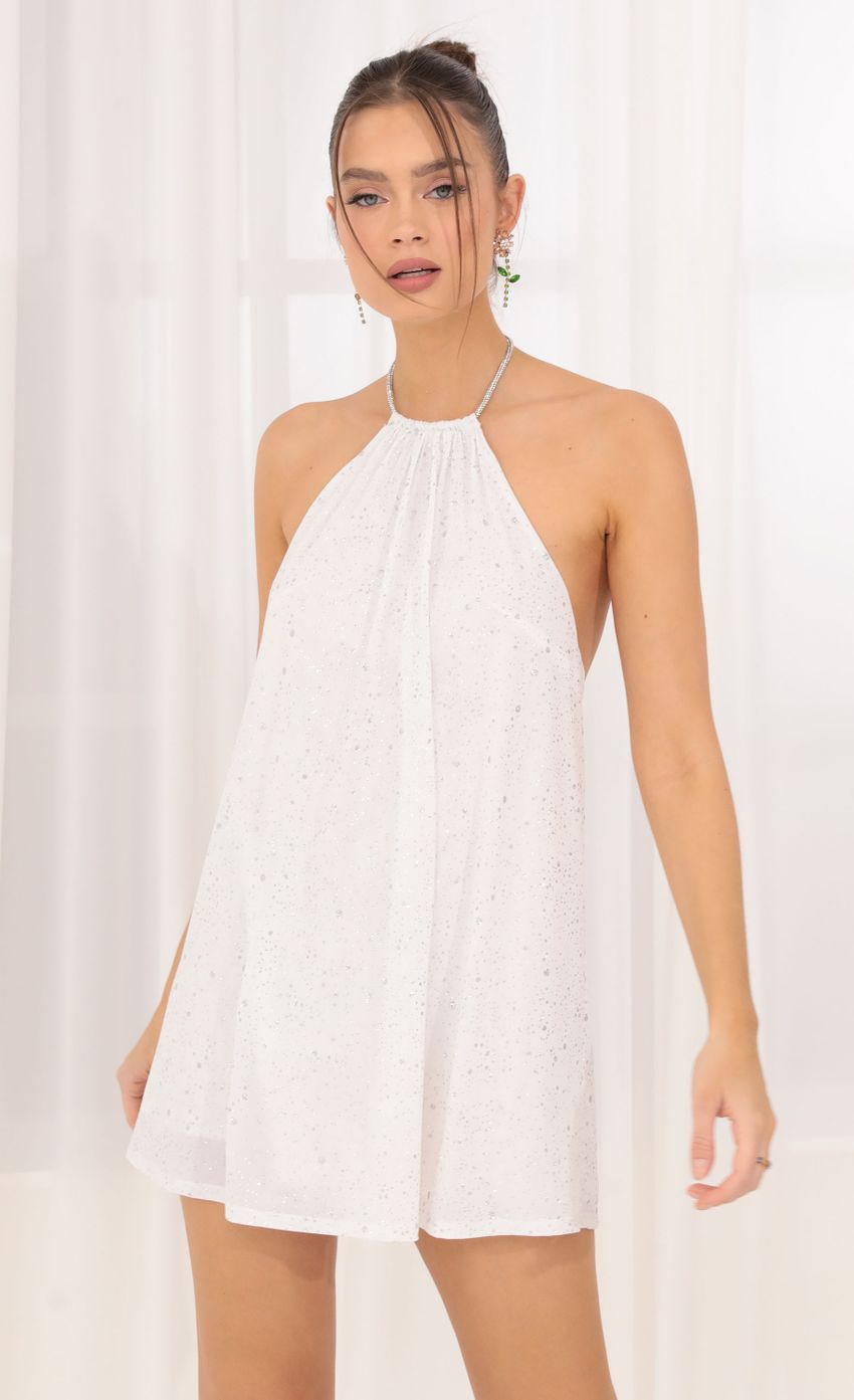 Picture Glitter Open Back Dress in White. Source: https://media-img.lucyinthesky.com/data/Sep22/850xAUTO/48d3bb6d-15fb-4840-95c2-ba015ba8b8f5.jpg