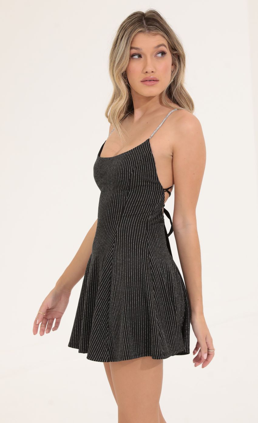Picture Striped A-Line Dress in Black. Source: https://media-img.lucyinthesky.com/data/Sep22/850xAUTO/5282ef19-e68d-492c-8c84-87da85f88f20.jpg