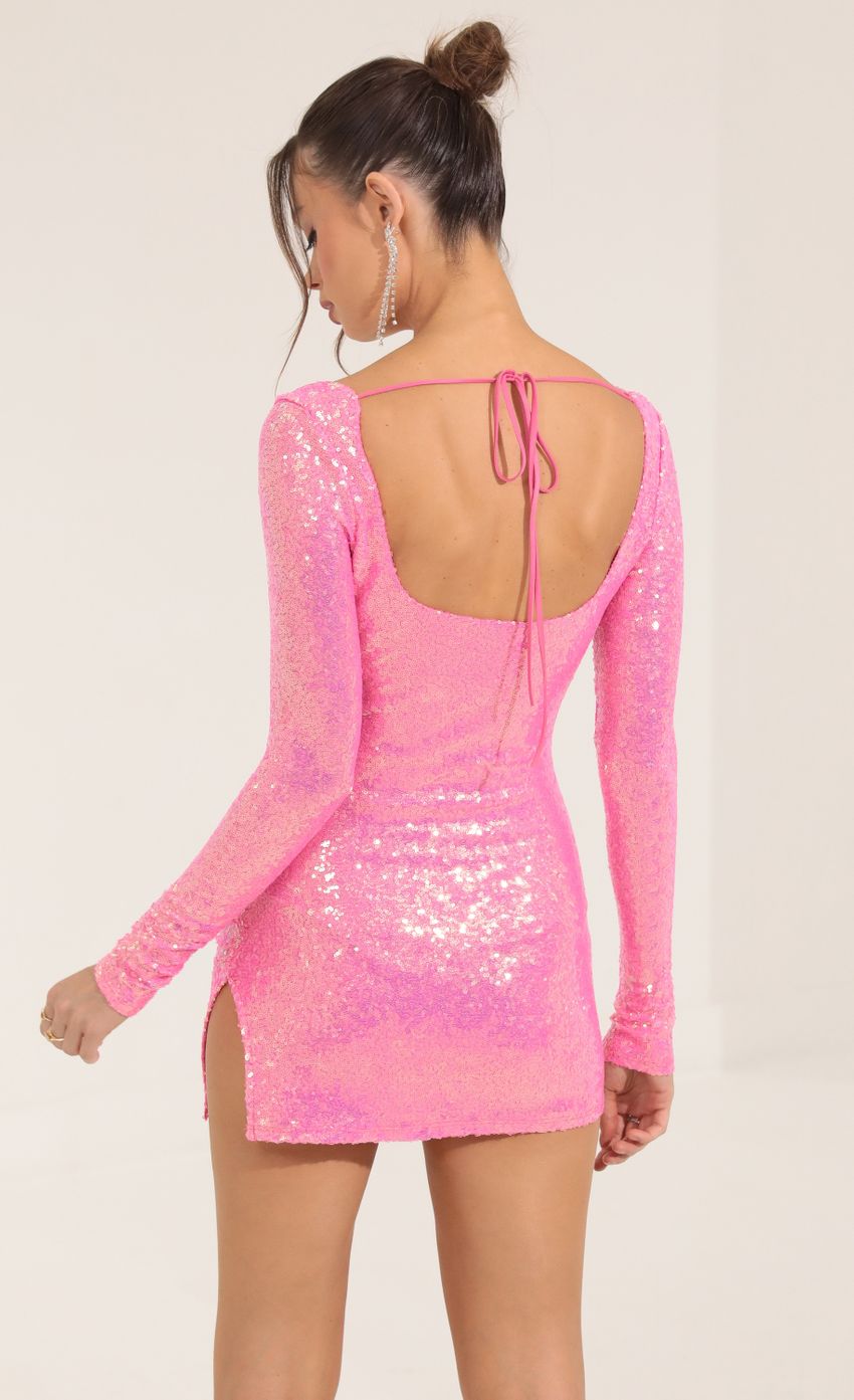 Picture Iridescent Sequin Long Sleeve Dress in Pink. Source: https://media-img.lucyinthesky.com/data/Sep22/850xAUTO/7a418ff9-f3a1-42de-872f-813cd8aedbdf.jpg