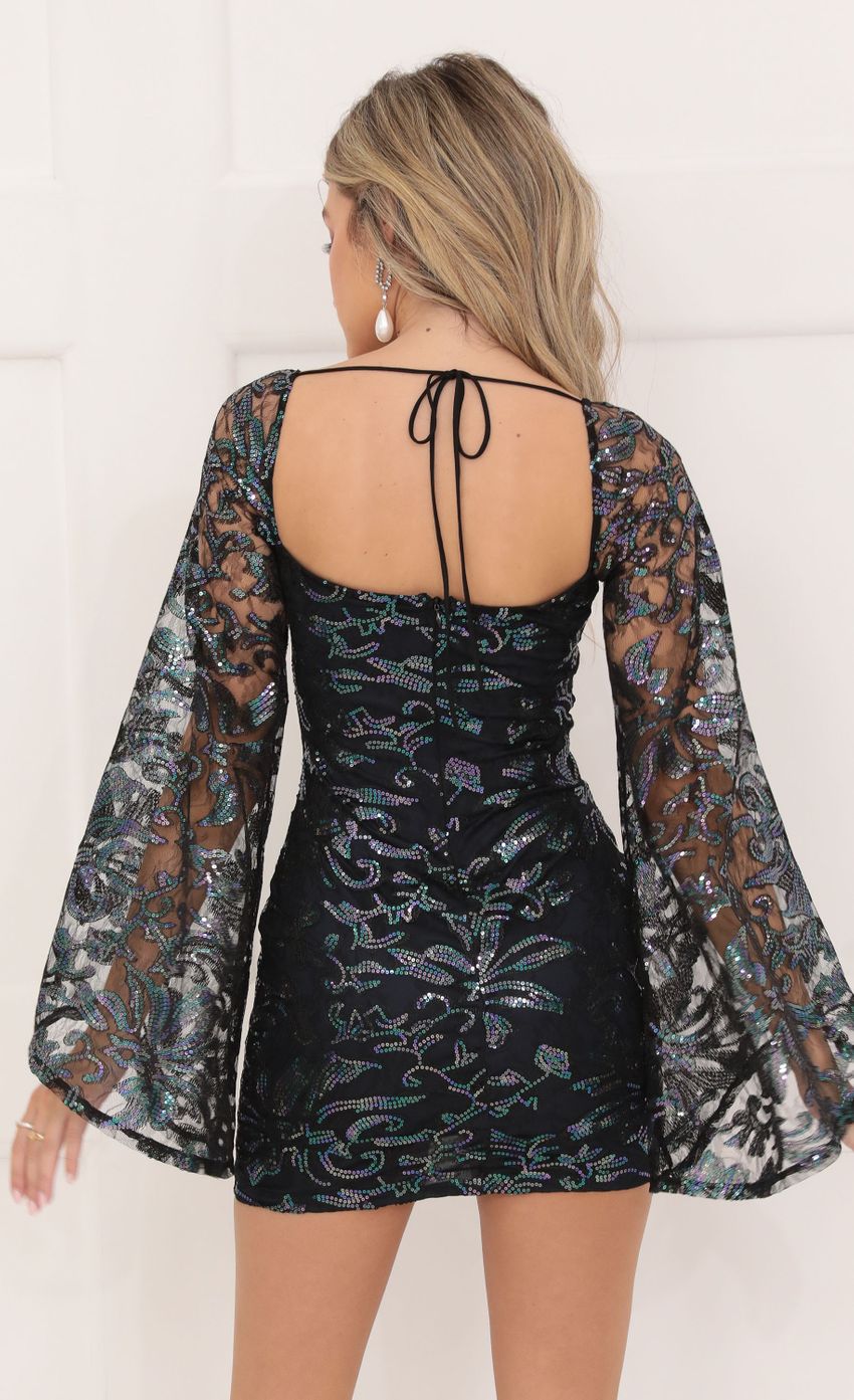 Picture Black Mesh Sequin Flare Sleeve Dress in Navy. Source: https://media-img.lucyinthesky.com/data/Sep22/850xAUTO/ab93275c-cf82-48d5-898a-9af030545edc.jpg