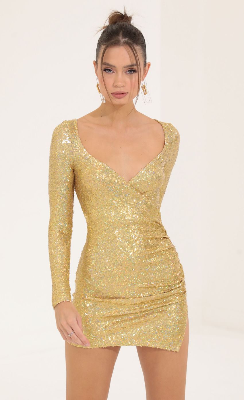 Picture Iridescent Sequin Long Sleeve Dress in Gold. Source: https://media-img.lucyinthesky.com/data/Sep22/850xAUTO/ee37d35d-85ef-4bfc-9aea-9cdf8a426cfe.jpg