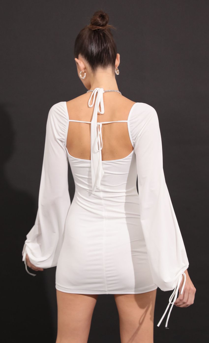 Picture Long Sleeve Bodycon Dress in White. Source: https://media-img.lucyinthesky.com/data/Sep22/850xAUTO/efa00712-c9bf-4116-b04c-20d18782d017.jpg