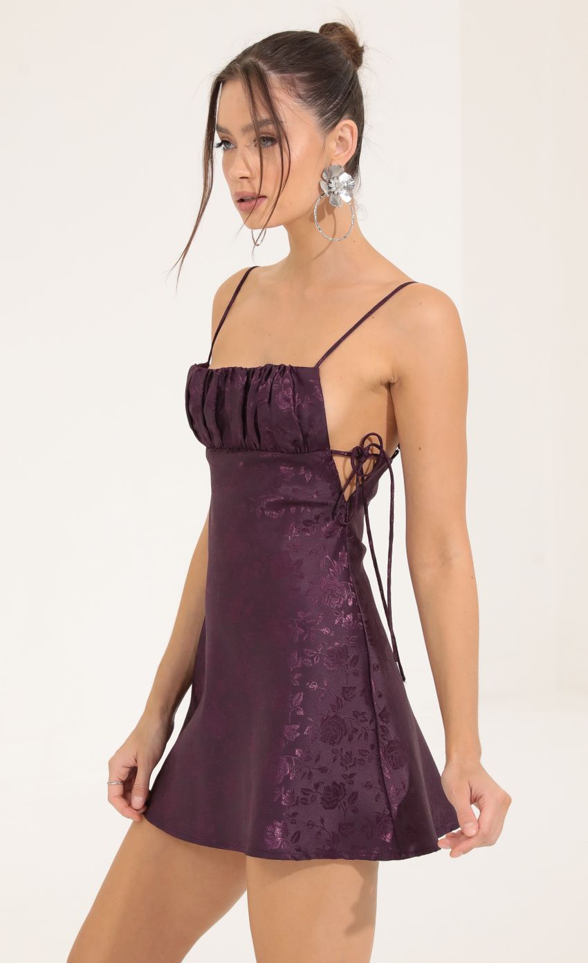 Picture Floral Jacquard A-Line Dress in Purple. Source: https://media-img.lucyinthesky.com/data/Sep22/850xAUTO/f8818330-f006-424b-9e17-c38ebf6f1380.jpg