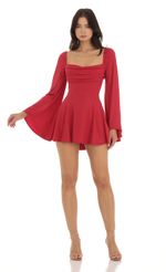 Picture Shimmer Flare Sleeve Dress in Red. Source: https://media-img.lucyinthesky.com/data/Sep23/150xAUTO/1cba95f0-c3a0-4108-8a73-03902a46ae89.jpg