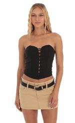 Picture Lace Up Corset Top in Black. Source: https://media-img.lucyinthesky.com/data/Sep23/150xAUTO/1e65eeca-28d1-43c0-9b20-1bc7c8c73425.jpg