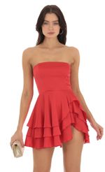 Picture Strapless Asymmetrical Dress in Red. Source: https://media-img.lucyinthesky.com/data/Sep23/150xAUTO/a737f3fb-2a9e-4663-8cad-c3ec5ba5e25d.jpg