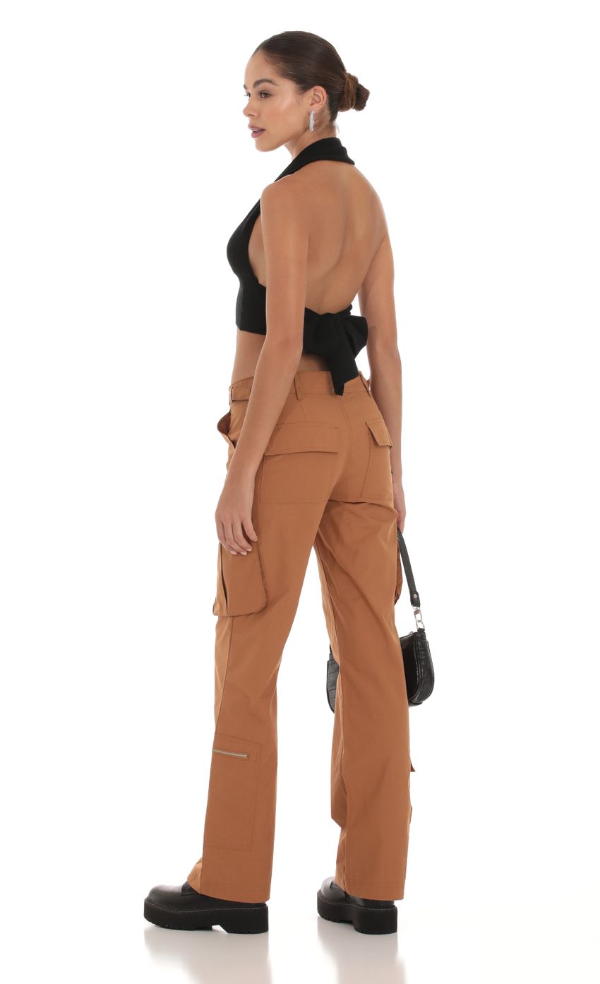 Picture Cargo Pants in Brown. Source: https://media-img.lucyinthesky.com/data/Sep23/850xAUTO/0b4e70c0-e7c3-419d-810d-123c177df7b5.jpg