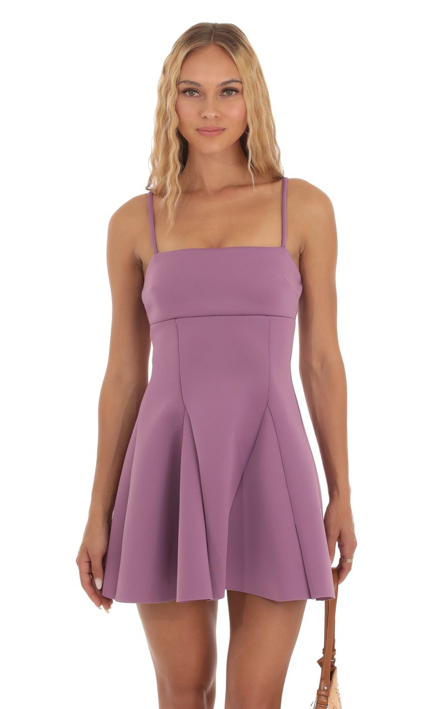 Picture Scuba Fit and Flare Dress in Purple. Source: https://media-img.lucyinthesky.com/data/Sep23/850xAUTO/14c8477a-68e1-4c6e-ae06-9708f7763c4c.jpg