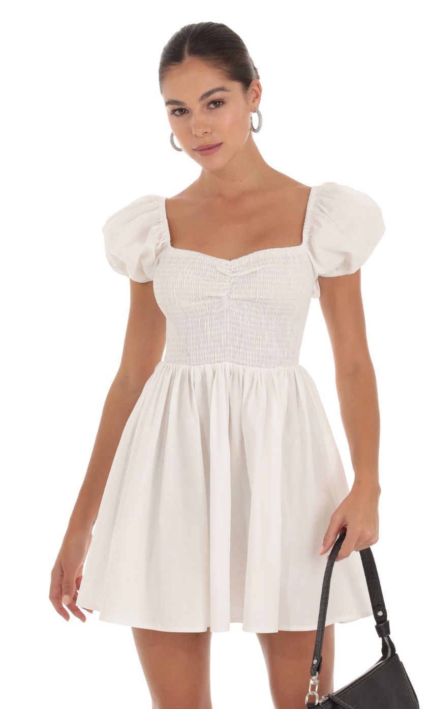 Picture Puff Sleeve Dress in White. Source: https://media-img.lucyinthesky.com/data/Sep23/850xAUTO/191d7e2b-72dd-43d4-b597-efb4cefe8472.jpg