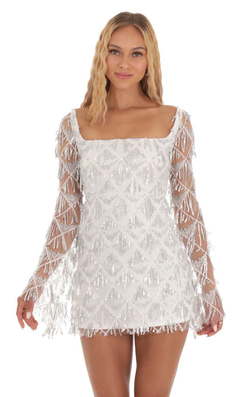 Picture Sadee Silver Fringe Sequin Dress in White. Source: https://media-img.lucyinthesky.com/data/Sep23/850xAUTO/1d183ecc-8cdc-4be1-8b4d-38e8c4316e89.jpg