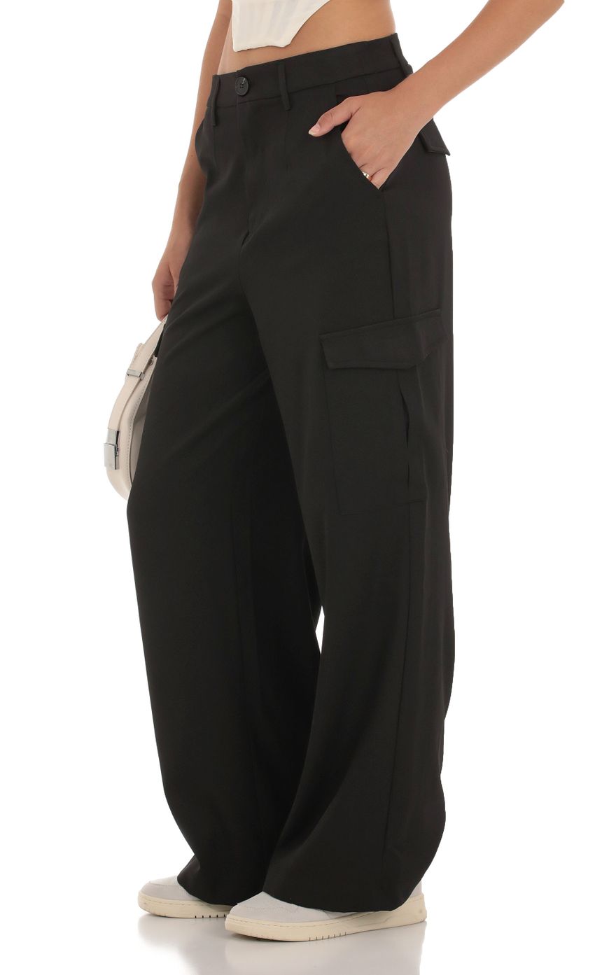 Picture Hecate Wide Leg Cargo Pants in Black. Source: https://media-img.lucyinthesky.com/data/Sep23/850xAUTO/22497955-125d-46c4-a307-49e73f4eb378.jpg