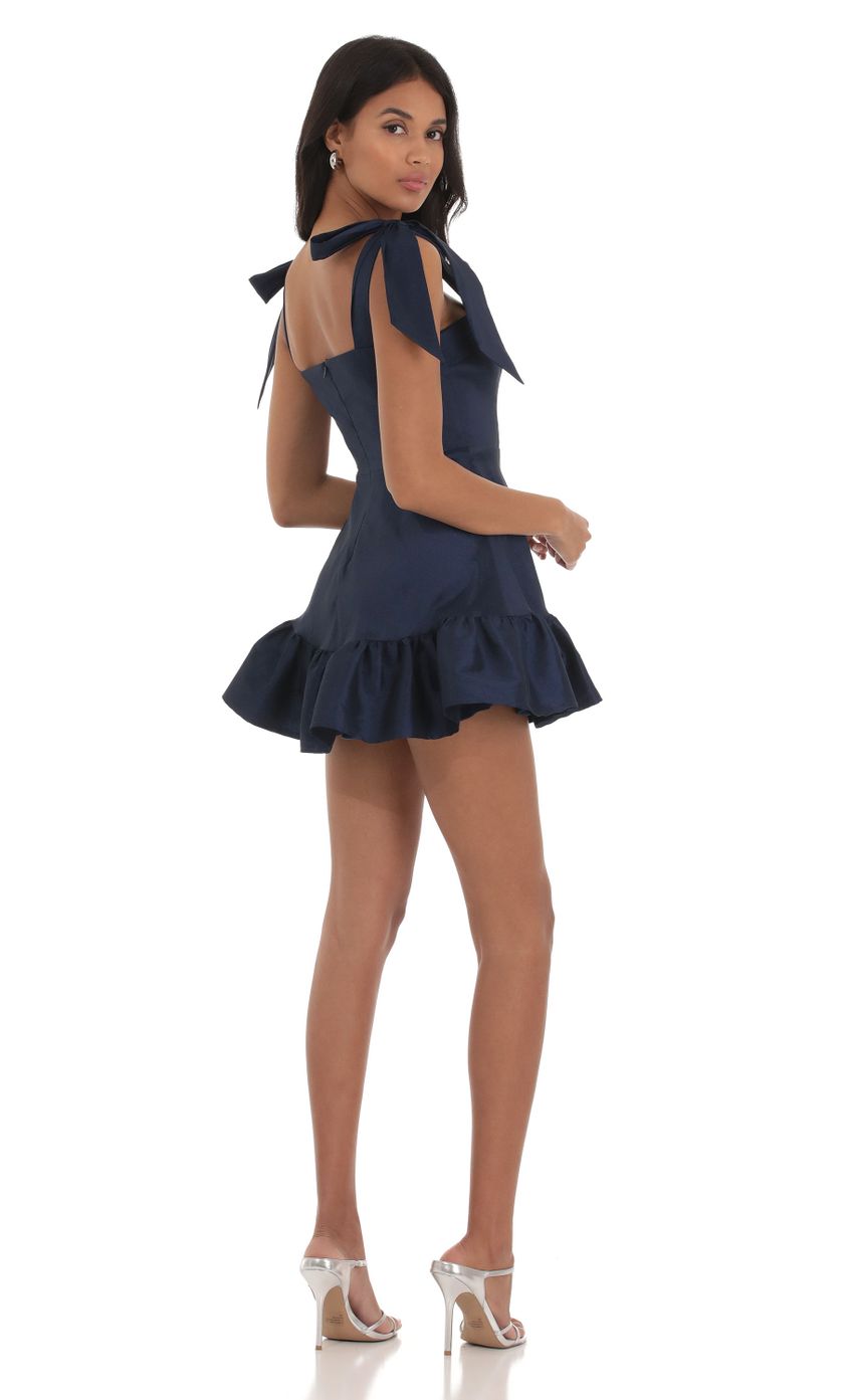 Picture Ruffle Square Neck Dress in Navy. Source: https://media-img.lucyinthesky.com/data/Sep23/850xAUTO/2c7c93ba-4ec5-4a85-8483-cac7d1bf0c1e.jpg