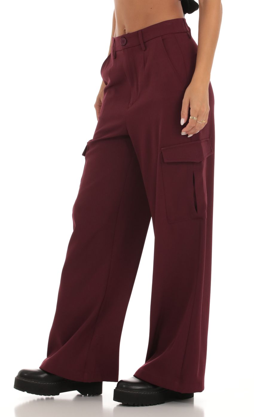 Picture Wide Leg Cargo Pants in Maroon. Source: https://media-img.lucyinthesky.com/data/Sep23/850xAUTO/2c804b02-1604-44de-b0ad-bbe1085b1941.jpg