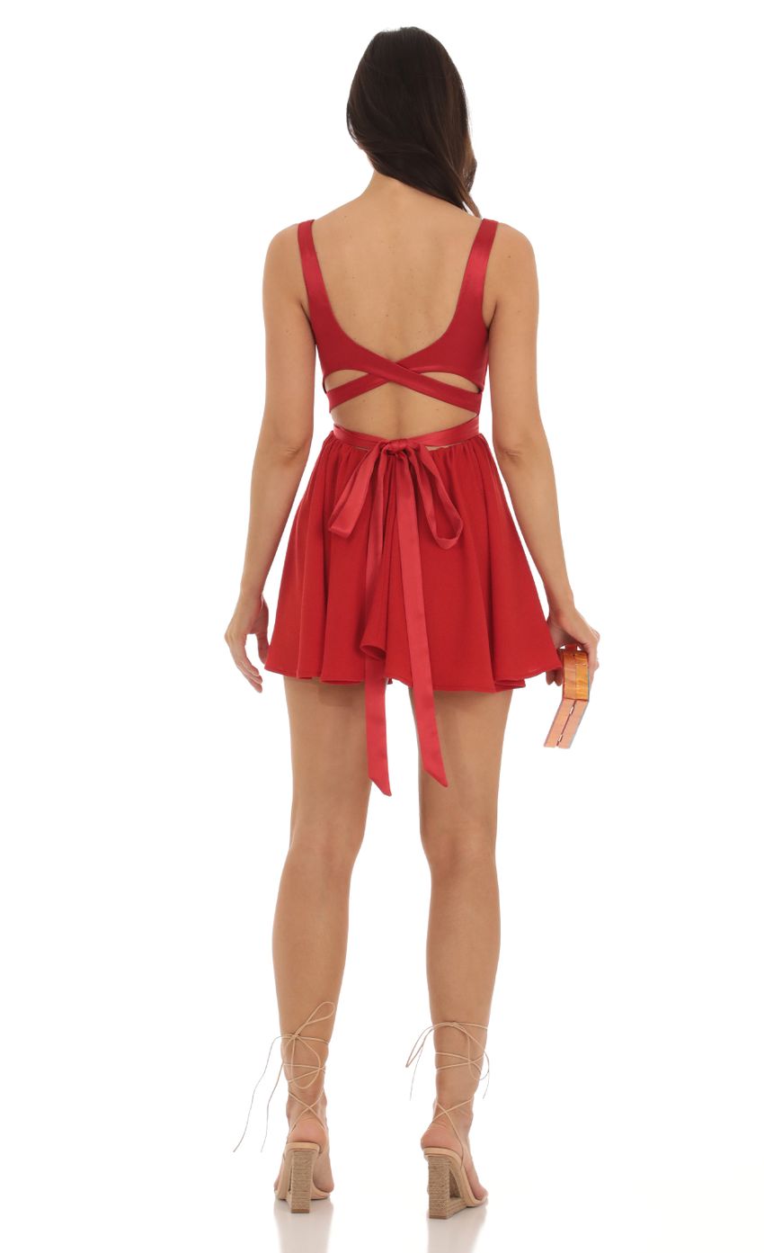 Picture Corset Wrap Dress in Red. Source: https://media-img.lucyinthesky.com/data/Sep23/850xAUTO/31760447-d841-4091-9be2-d554c9f7842a.jpg