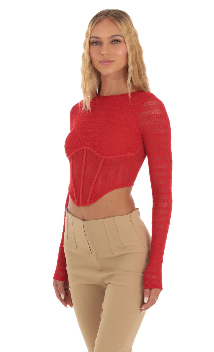 Picture Long Sleeve Corset Top in Red. Source: https://media-img.lucyinthesky.com/data/Sep23/850xAUTO/383f40ff-5694-48a2-a940-678addebdc85.jpg
