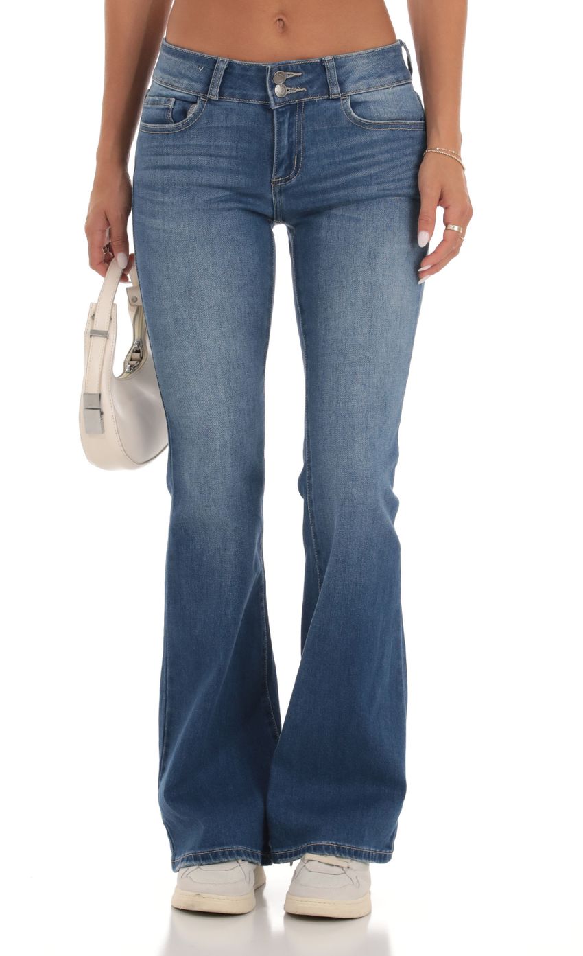 Picture Low Rise Flare Jeans in Light Denim. Source: https://media-img.lucyinthesky.com/data/Sep23/850xAUTO/3985f9ef-1846-48d7-ae2b-431058b38ad1.jpg
