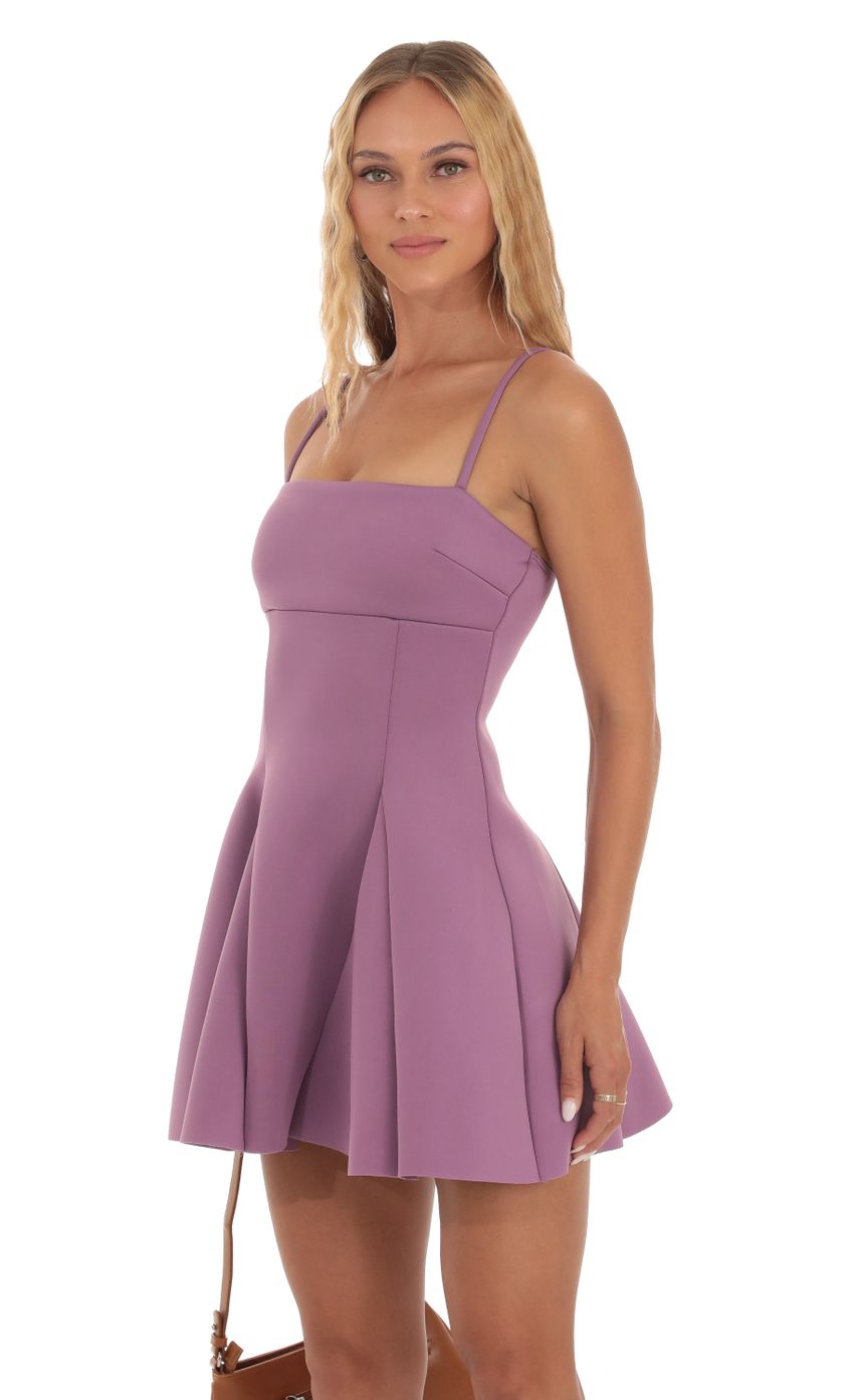 Picture Scuba Fit and Flare Dress in Purple. Source: https://media-img.lucyinthesky.com/data/Sep23/850xAUTO/3bee8626-2657-4c31-a877-e58e505b0f08.jpg