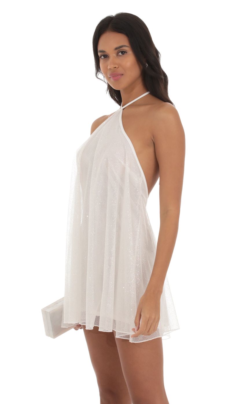 Picture Shimmer Halter Shift Dress in White. Source: https://media-img.lucyinthesky.com/data/Sep23/850xAUTO/4af45181-04cb-4fce-b64a-72343ba63938.jpg